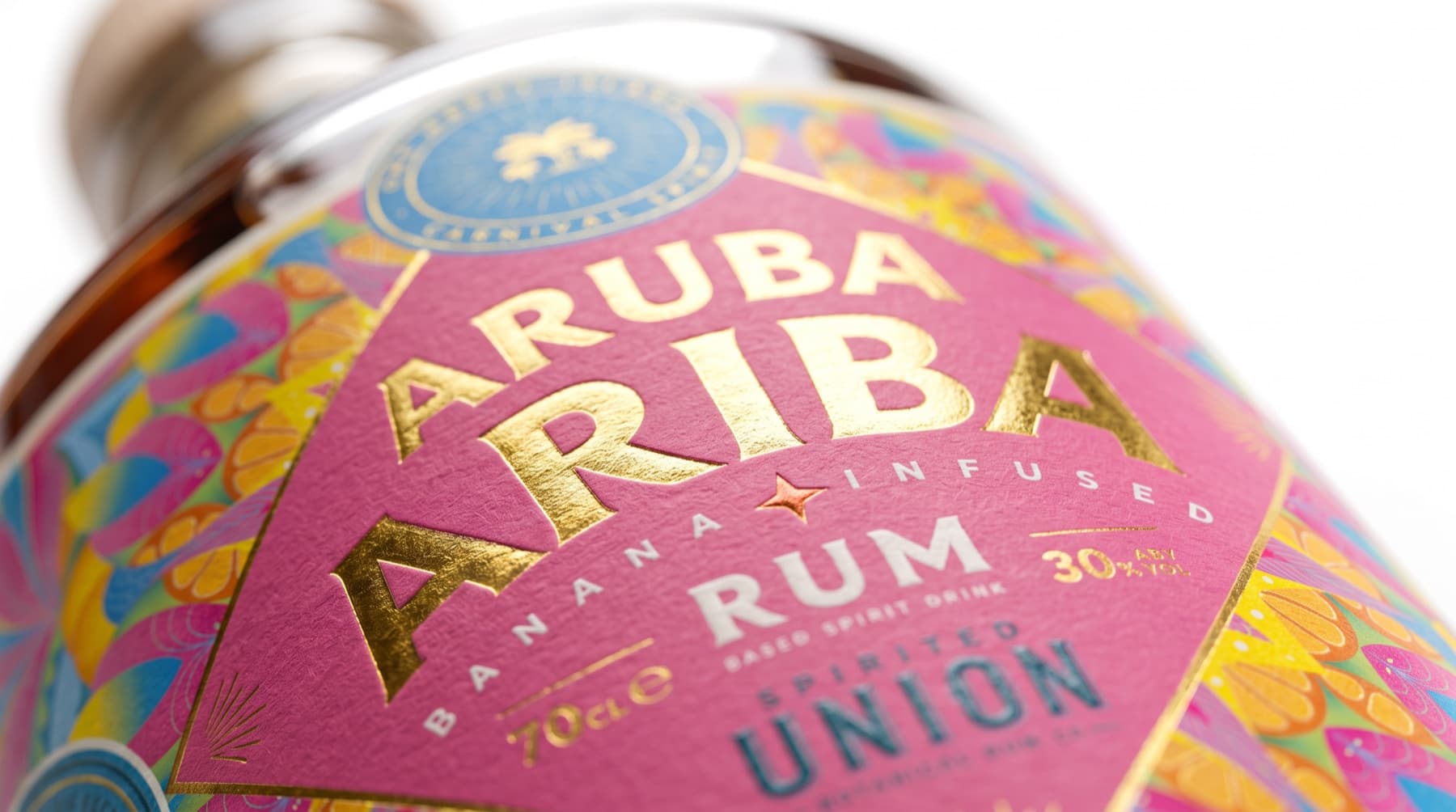 Close-up of the Aruba Ariba banana infused rum label with gold foil lettering