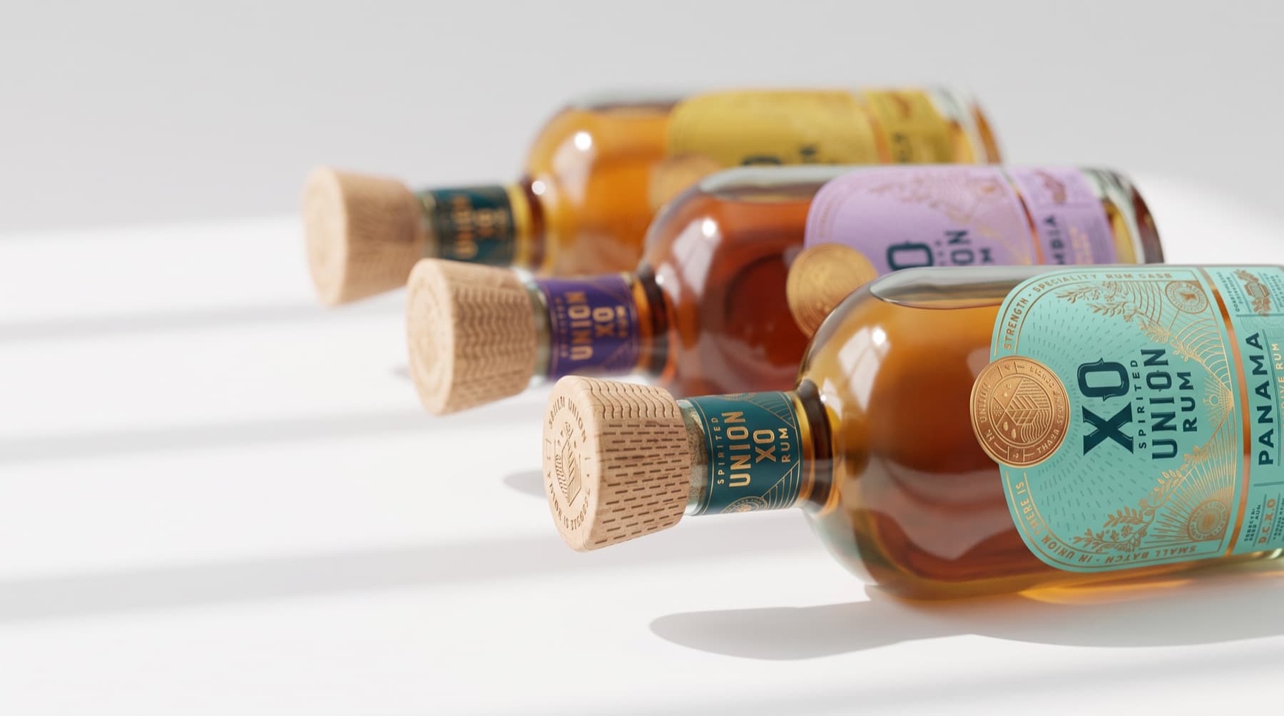 Cork closures of Spirited Union XO rum bottles lying on a white surface